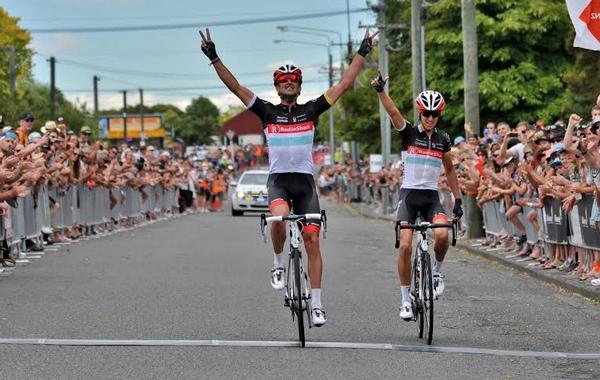 Hayden Roulston celebrates victory from George Bennett in the Calder Stewart national road cycling championships in January. 